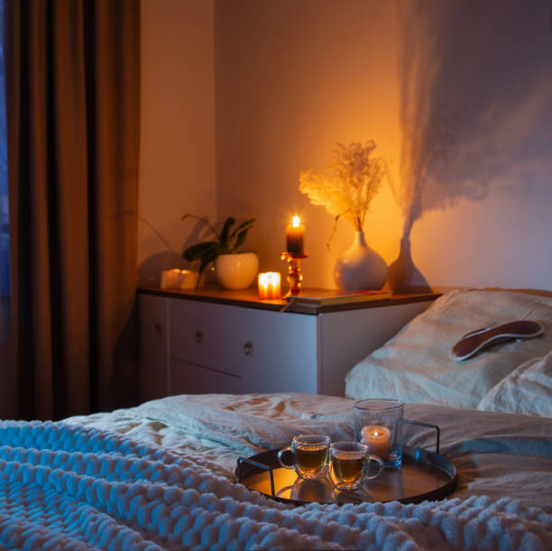 istock cup of tea in bedroom at night 2004666890