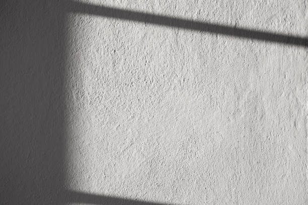 istock background of wall with shadow and sunlight 2004667412