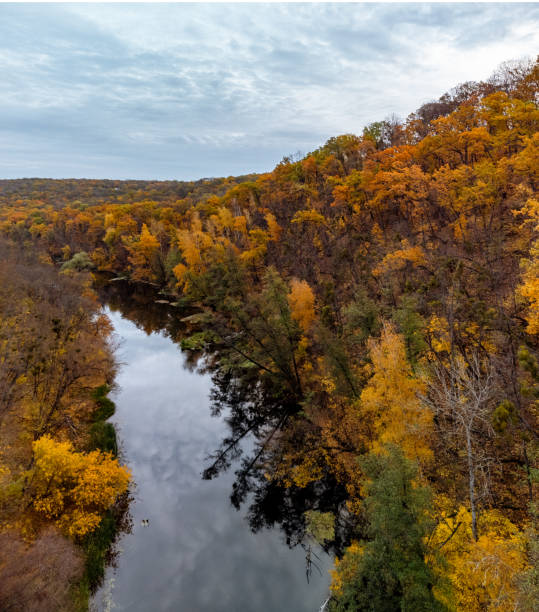 istock Autumn aerial river scenery with forest riverside 2004689448