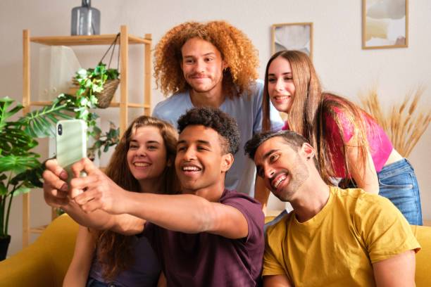 istock Multiethnic group of young people taking a selfie. 2004696880