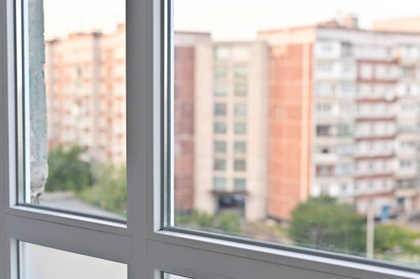 istock plastic balcony window. street view from the window 2004726856