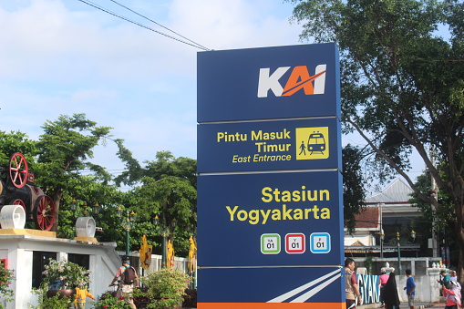 The signboard of Yogyakarta station in Yogyakarta Special Region of Indonesia, with blue sky in the background on a clear morning.