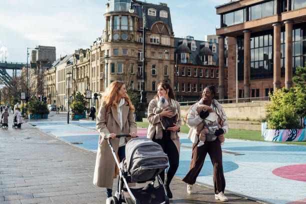istock Cheerful Mums Walking in the City 2004738976