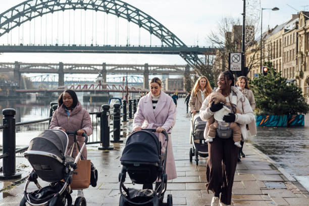 istock Mothers Out Walking with Babies 2004740568