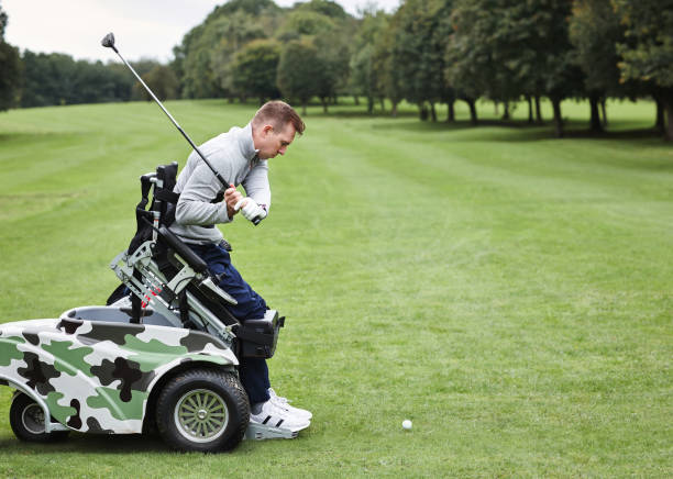 istock Golf, swing and man in wheelchair playing on grass for weekend hobby, innovation or technology. Morning, sports and person with disability on course in mobility aid for competition, club or workout 2004761897