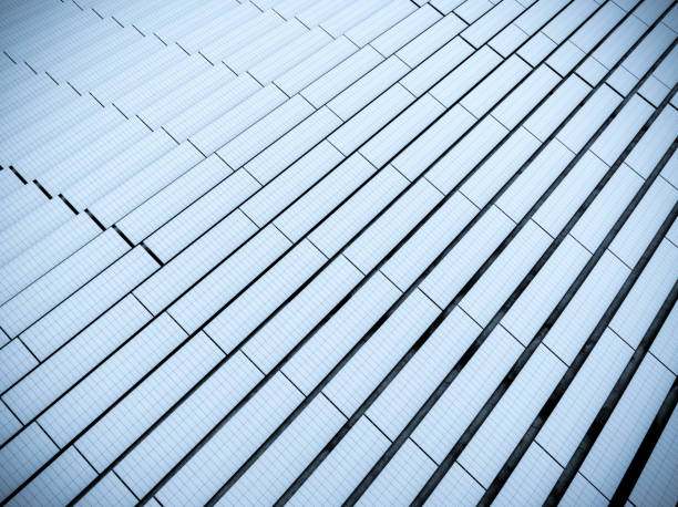 istock Snow covered solar panels in a field during winter 2004776854