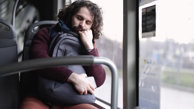 Passenger sleeping in the bus