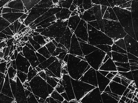 broken glass on a dark background photo