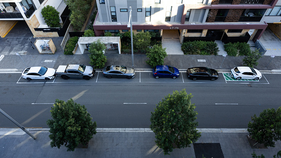 Sydney, Australia - February 12, 2024: Cars parked on the road side.