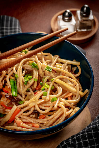 istock Fried noodles with chicken and vegetables. 2004864913