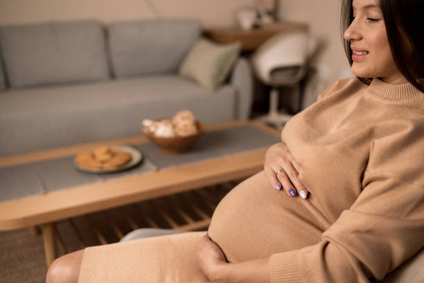 istock Pregnant woman resting at home 2004884656