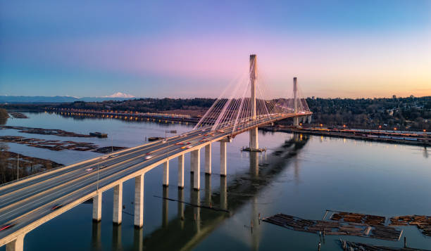 istock Port Mann Bridge across Fraser River. Sunset Sky. 2004893903