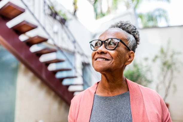 istock Senior woman contemplating at back yard 2004931158