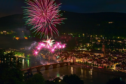 Heidelberg, Germany - May 20, 2013: Firework display at Karl Theodor Bridge. The Heidelberg Castle Lighting and Fireworks is annual event to commemorate the burning of the Heidelberg Castle by the French troops in 1693.
