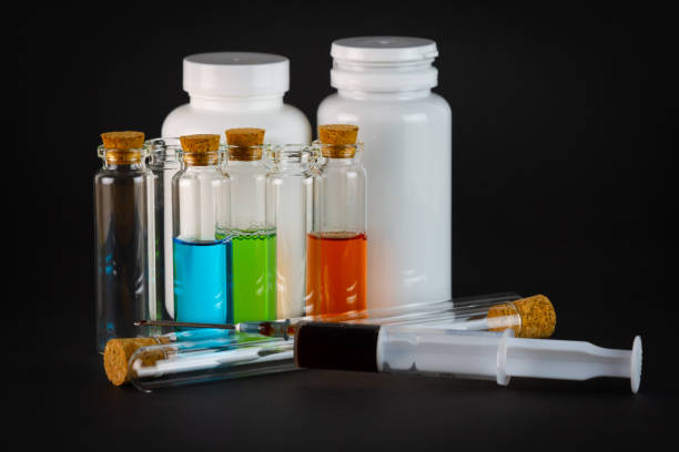 istock Laboratory test-tubes with colorful liquids 2004990911