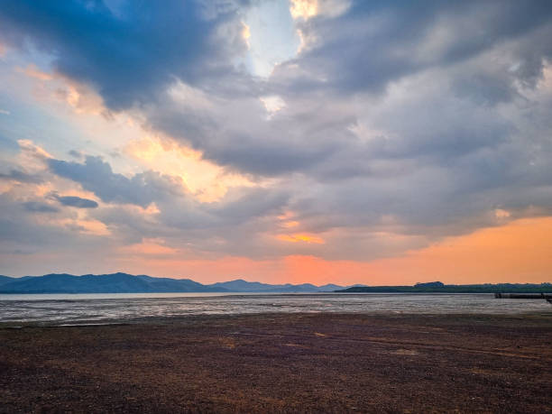 istock red sky sunset and river or lake 2005005965