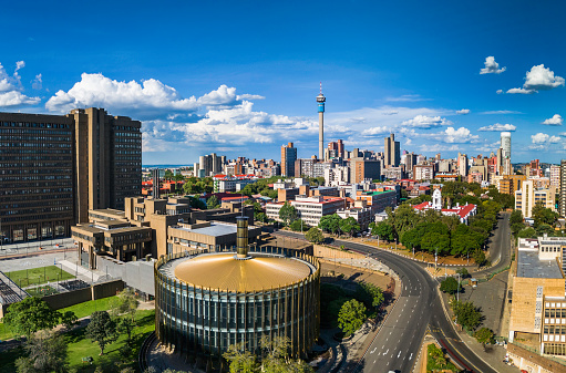 Johannesburg inner cityscape with the round council building and communication tower, Johannesburg is also known as Jozi, Jo'burg or eGoli, is the largest city in South Africa.