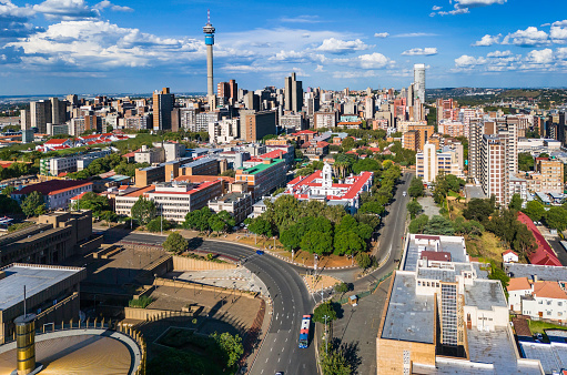 Johannesburg inner cityscape with the round council building and communication tower, Johannesburg is also known as Jozi, Jo'burg or eGoli, is the largest city in South Africa.