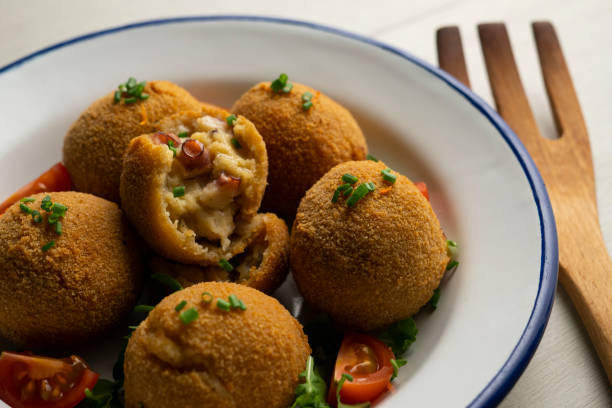 istock Spanish croquettes made with bechamel sauce and stuffed with octopus. Traditional tapa from northern Spain. 2005014534