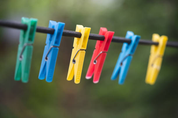 istock different colors of clothespins for washed clothes on a string 2005036636