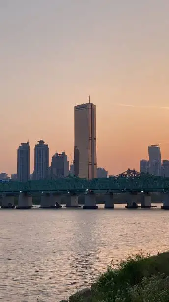 The 63 Building and Han River with Sunset in Seoul, South Korea.