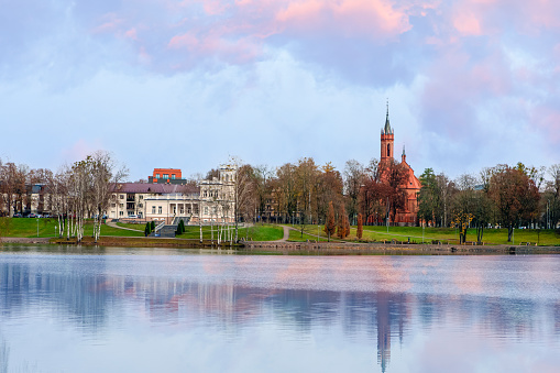 Panoramic View of Museum of Druskininkai in Lithuania From Point of Pond Near Forest in Autumn Colors in Lithuania.Horizontal Image