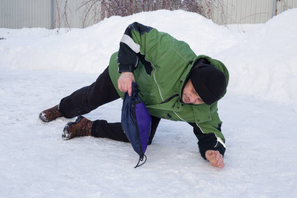 istock man slipped on the ice and fell 2005117308