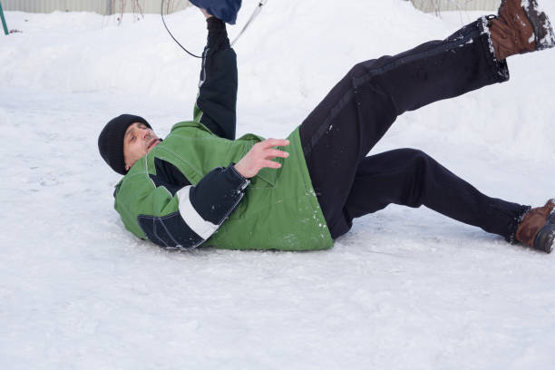 istock man slipped on the ice and fell 2005117317