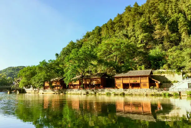 Ancient Houses On The Banks Of Tuojiang River In Fenghuang Ancient Town, China. Fenghuang Ancient Town Is One Of The Most Famous Old Towns In China.