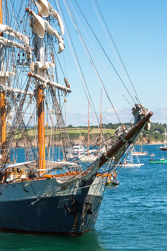 Three-masted sailing ship at quay, seen in profile, in the port of Rosmeur, Douarnenez, Brittany.