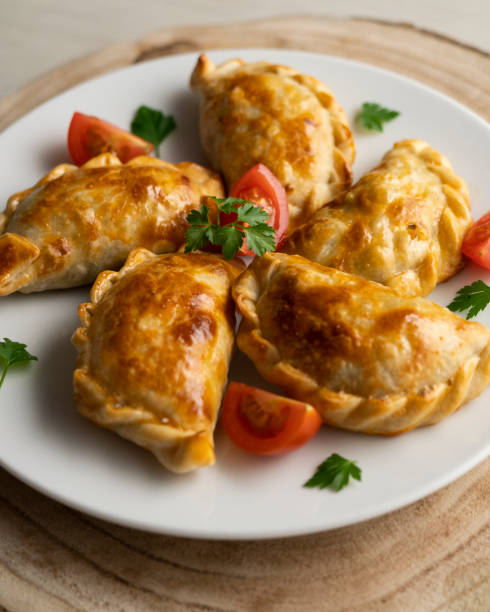 istock Baking delicious Argentine empanadas with chicken and vegetables. 2005198135