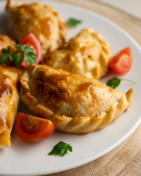 istock Baking delicious Argentine empanadas with chicken and vegetables. 2005198136