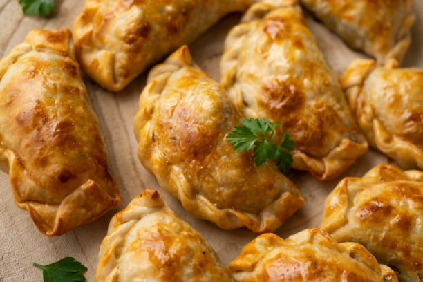 istock Baking delicious Argentine empanadas with chicken and vegetables. 2005198159