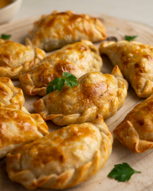 istock Baking delicious Argentine empanadas with chicken and vegetables. 2005198163