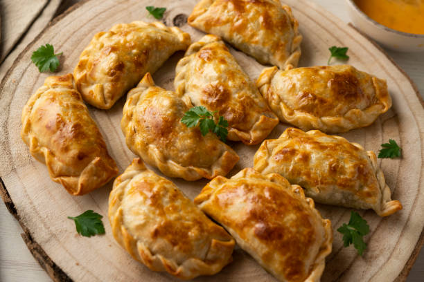 istock Baking delicious Argentine empanadas with chicken and vegetables. 2005198695