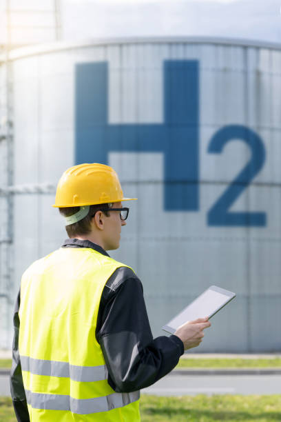istock Engineer on a background of Hydrogen factory 2005204044