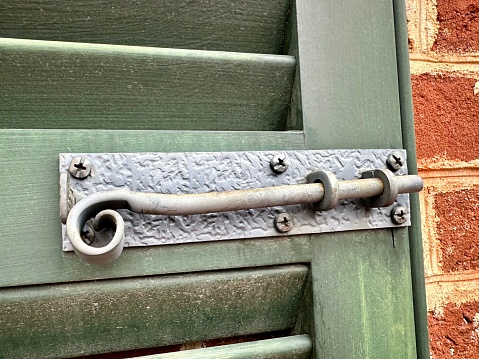 Iron Latch Lock on a Wooden Door