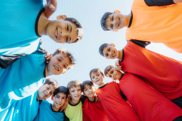 istock Youth Soccer Team Standing Together on the Field in Unity 2005218249