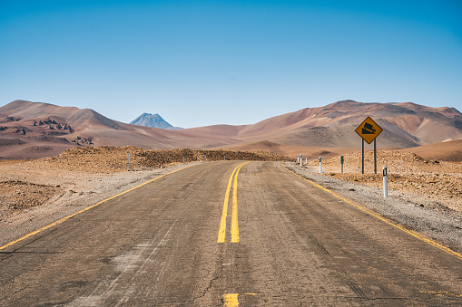 low angle view on lonely country road in the atacama desert