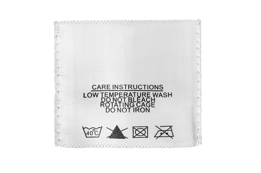 Care instructions clothes label isolated on white background