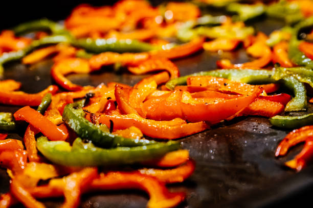 Red and green bell peppers fried in extra virgin olive oil