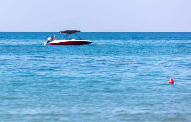 istock Boat on the blue sea. 2005247946