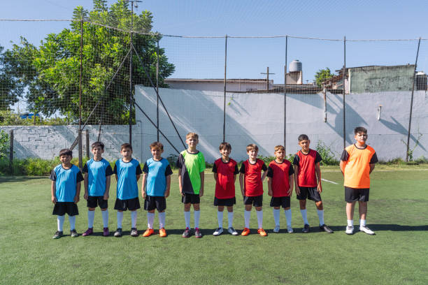 istock Youth Soccer Team Posing Together on the Field in Uniform 2005250089