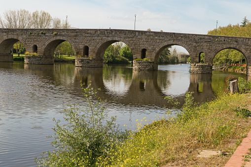 Old Roman bridge over the River Guadiana in Mérida, Extremadura seen on the Camino Via de la Plata pilgrimage route from Seville to Santiago de Compostela