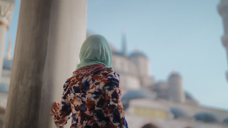 Multiracial female tourist visiting Istanbul and Blue Mosque in Türkiye Turkey