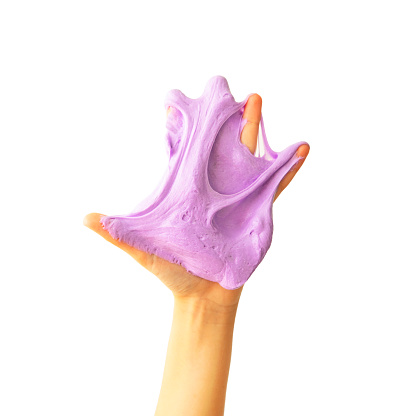 Child hand with sticky slime isolated on white background