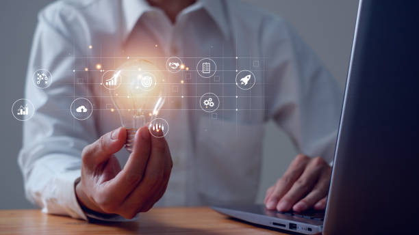 istock Business global internet connection application technology and digital marketing, hand holding Light bulb Global Internet connection.Digital link tech,Financial and banking. 2005320544