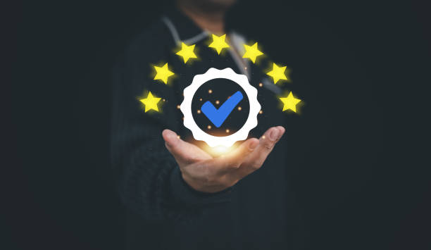 istock Concept of guarantee standards iso certification and standardization service quality and assurance : Businessman Is using finger touching for certify with five star after he has verified it. 2005336103