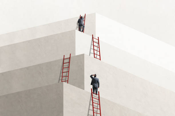 istock Man Looking Up At Another Man Who Has Reached The Top 2005388733
