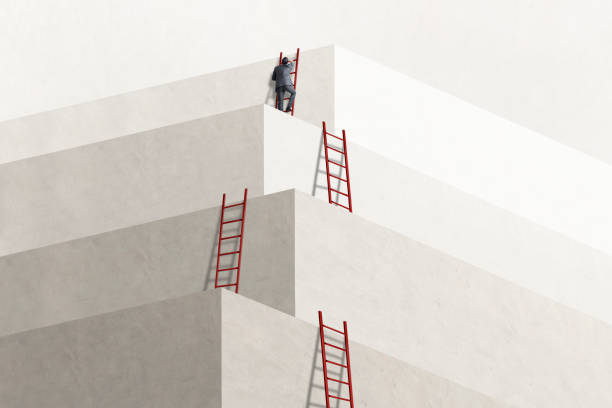 istock Man Using Ladder To Reach His Goal 2005388734